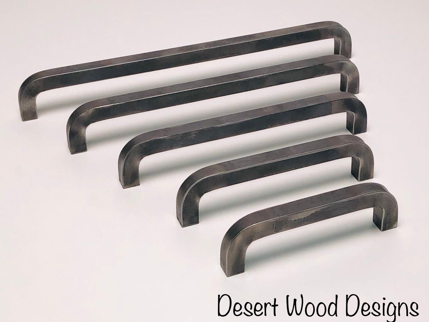 Iron cabinet pulls. Hand forged cabinet pulls. Farmhouse, industrial, modern, studio, and rustic pulls.