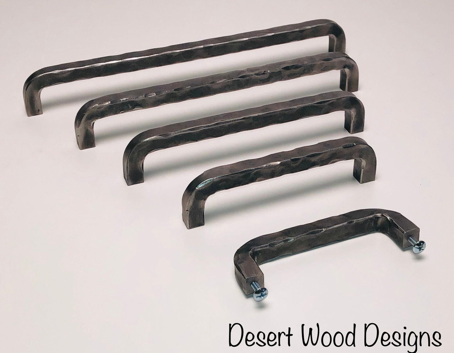 Hand forged hammered cabinet pulls. Farmhouse, industrial, modern, studio, and rustic pulls