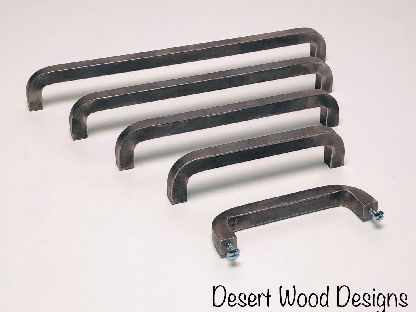 Iron cabinet pulls. Hand forged cabinet pulls. Farmhouse, industrial, modern, studio, and rustic pulls.
