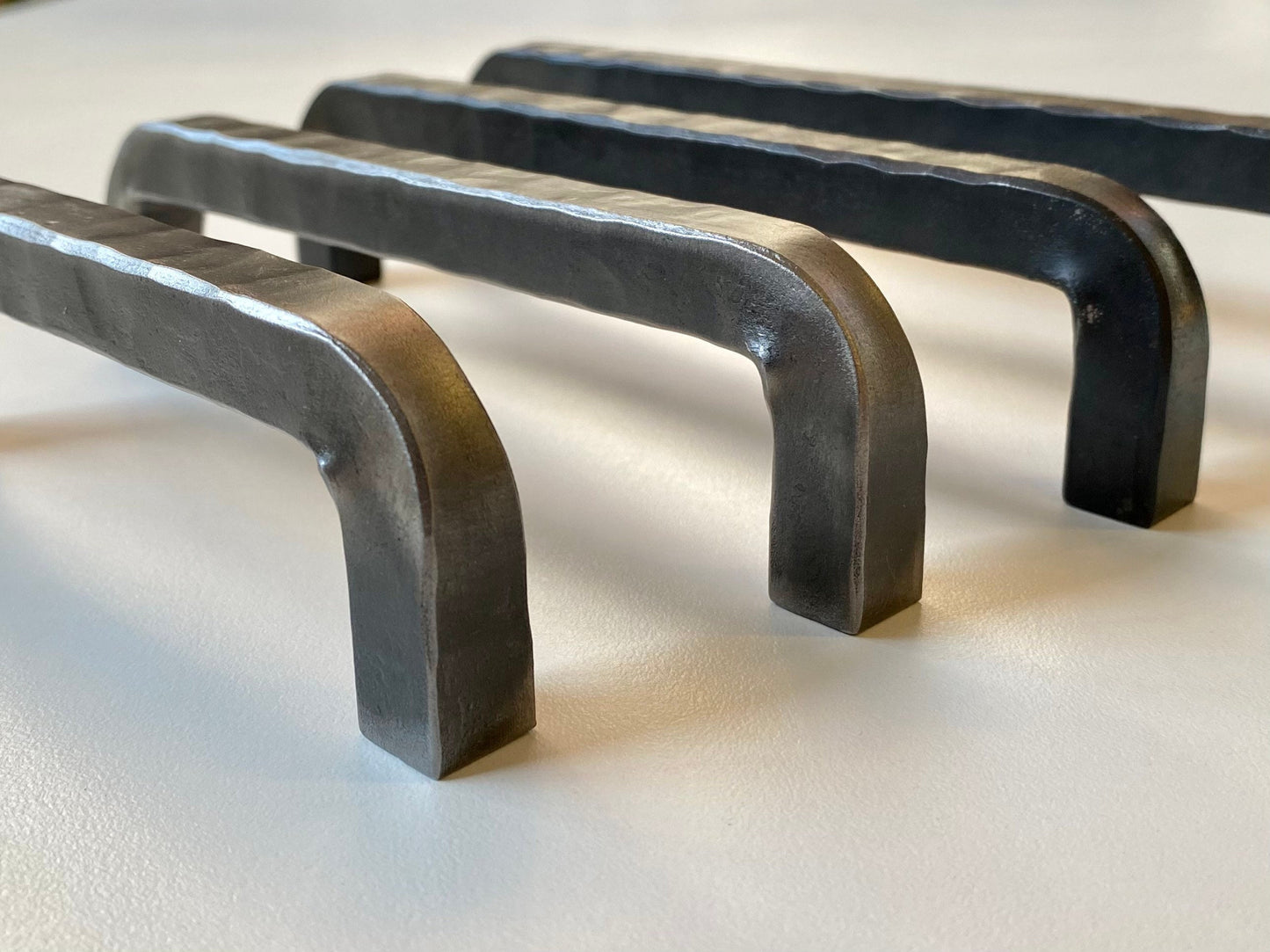 Hand forged hammered cabinet pulls. Farmhouse, industrial, modern, studio, and rustic pulls