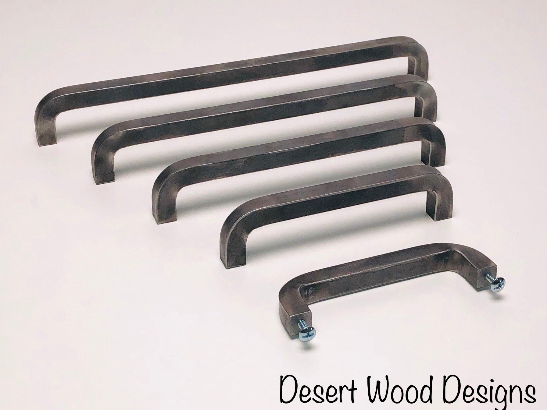 Iron cabinet pulls. Hand forged cabinet pulls. Farmhouse, industrial, modern, studio, and rustic pulls.